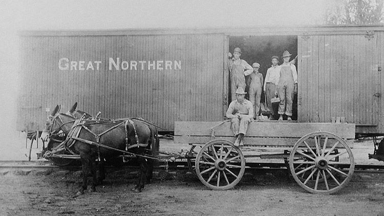 Early 20th century railyards, as motor trucks and rail rose