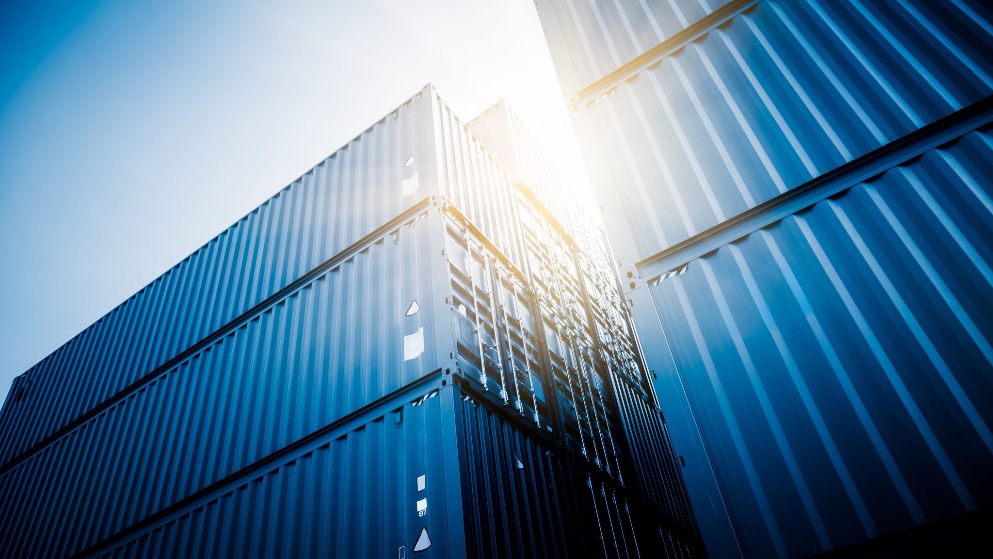 Stacked intermodal shipping containers at a freight terminal